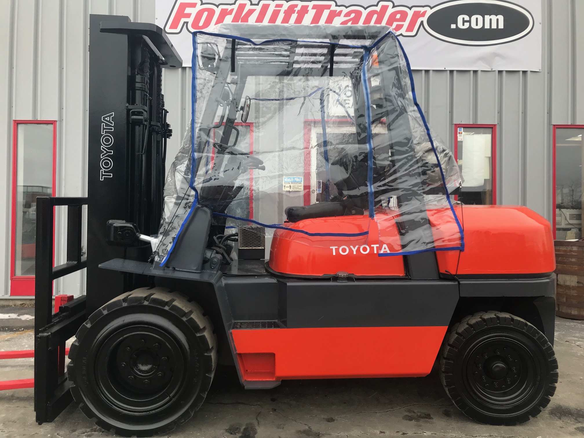 Orange toyota forklift with 130" lift height for sale